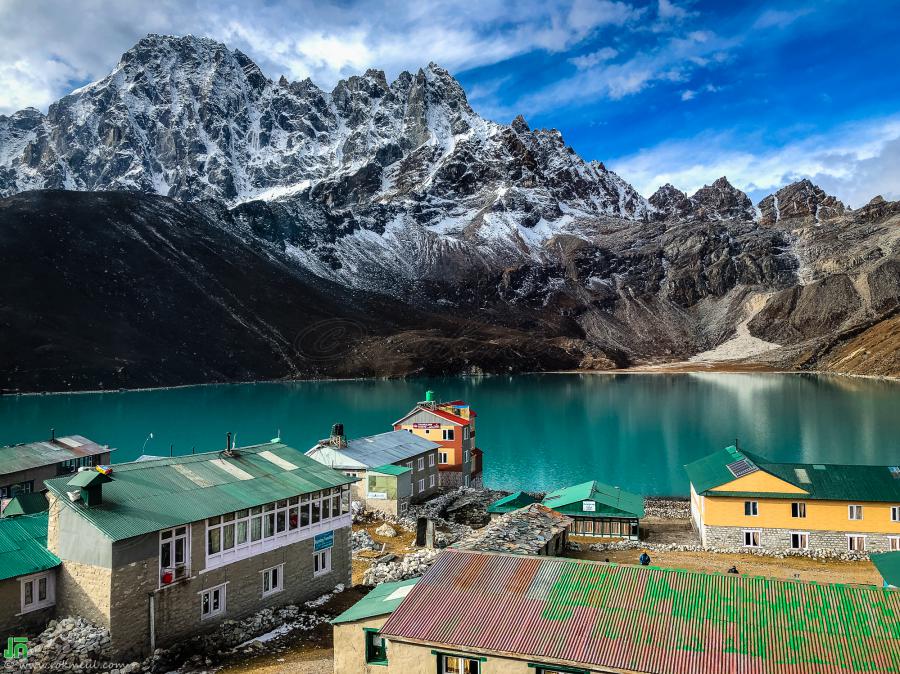 Gokyo Village and Gokyo Lake, view from Namaste Lodge. Behind the lake is the Phari Lapcha Peak with the elevation of 6017m.